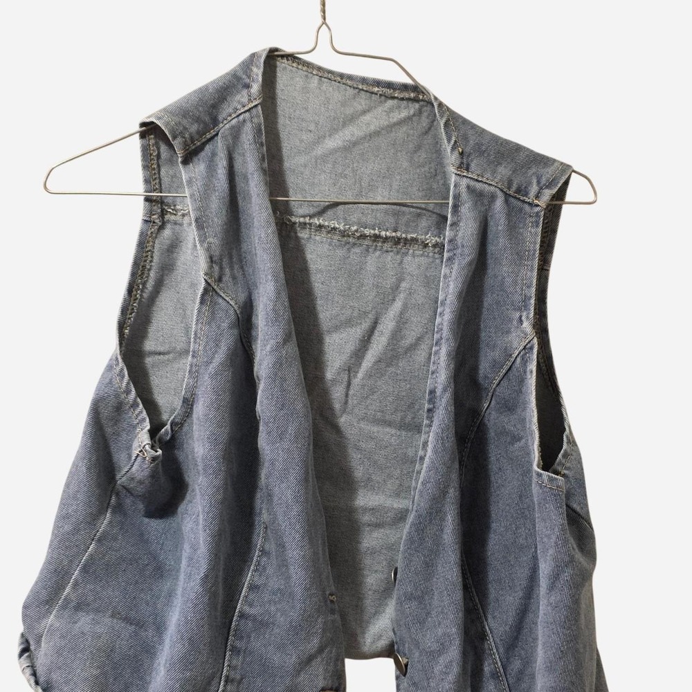 Blue denim vest with a boho vibe